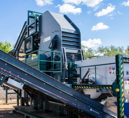 Industrial hammer mill for waste processing by Waste Initiatives.