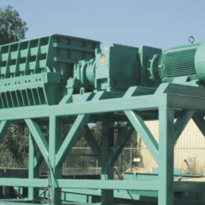 Industrial tyre grinder for recycling waste tyres and rubber materials.