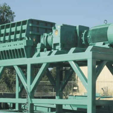 Industrial tyre grinder for recycling waste tyres and rubber materials.