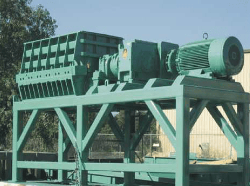 Industrial tyre grinder for recycling waste tyres and rubber materials.