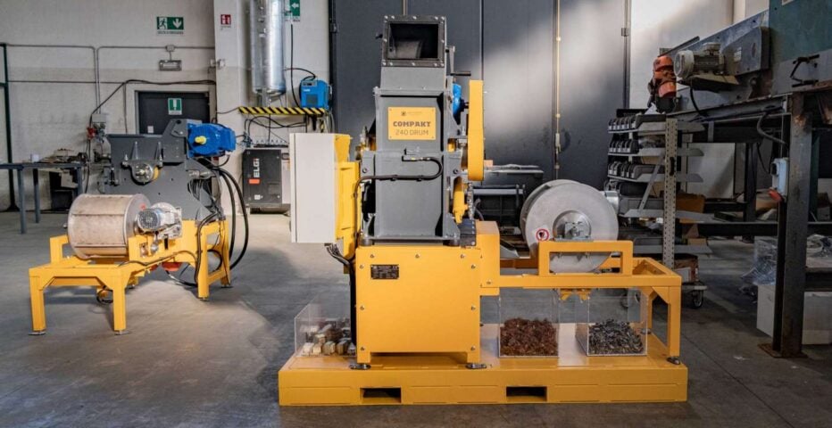 Heavy-duty industrial hammer mill used for waste processing and recycling.