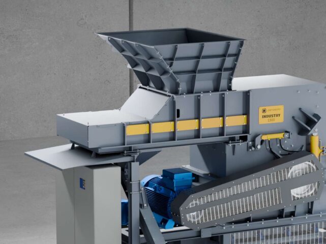 Industrial hammer mill for waste processing by Waste Initiatives.